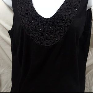 Dressy sleeveless top.